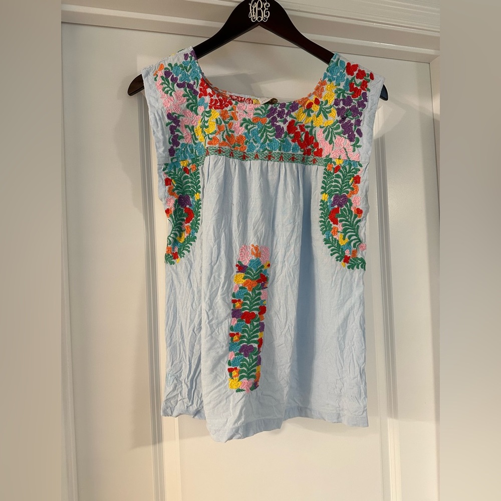 J. Marie Collections top
